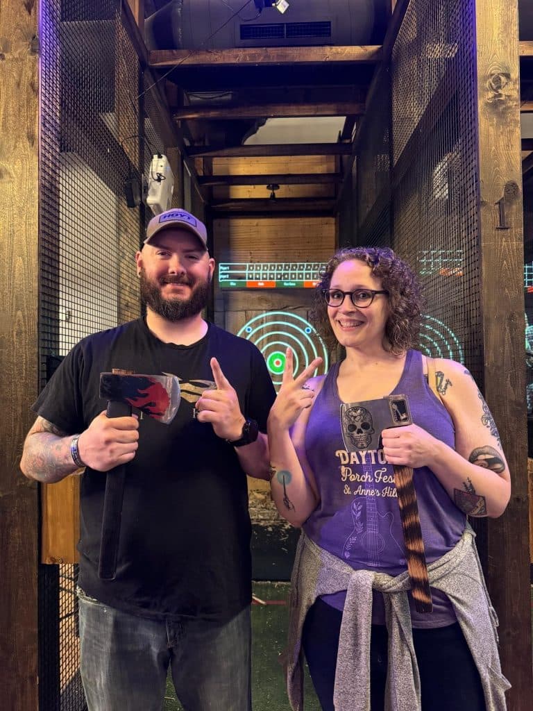 Couple enjoying axe throwing at Two Social